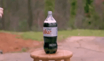 Sword vs Coca Cola bottle