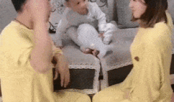 Dad and Mom playing and their Son