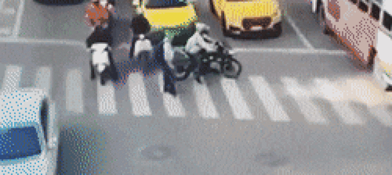 Motorcyclist helps old man to cross the street
