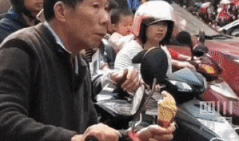 Waiting for his grandchild to get off school